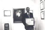 Bob Hamblin with the Don Perkins Award, Chapman College, Orange, California