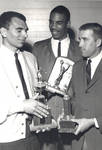 Larry Beard, Jeff Cortwright, and Charlie Davis, Chapman College basketball team members, 1962.