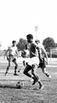 Chapman College soccer team member in action, 1968