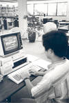 Using a computer in the Thurmond Clarke Memorial Library, Chapman College, Orange, California