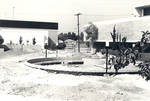 Constructing the fountain for the mall at Thurmond Clarke Memorial Library, Chapman College, Orange, California, 1979