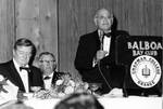 Victor C. Andrews introduces John Wayne for presentation of award, Challenge '70 Dinner