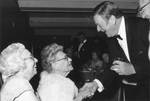 John Wane greets Mrs. Louis Moulton at the Chapman College Challenge '70 Dinner