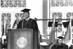 Mark Cary speaking at Commencement, 1984