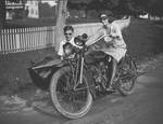 Peggy White on a motorcycle, 1924
