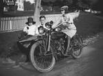 Peggy White on a motorcycle, 1924
