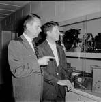 Eric Berndt and Rudy Vallee looking at Berndt Museum Photography display
