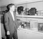 Rudy Vallee looking at Berndt Museum Photography display