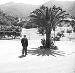 Eric Berndt by a palm tree