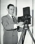 Eric Berndt, ca. 1958, with Pathe 28mm camera