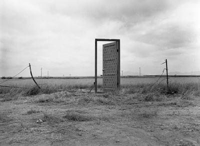 Richard Lou, Border Door, 1988, performance, Documentary photograph by Jim Elliot.