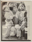 Nurse with Vietnamese Orphans Going to US